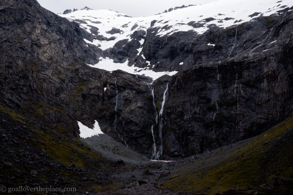 waterfalls cascading down from a glacier in Fjordland National Park